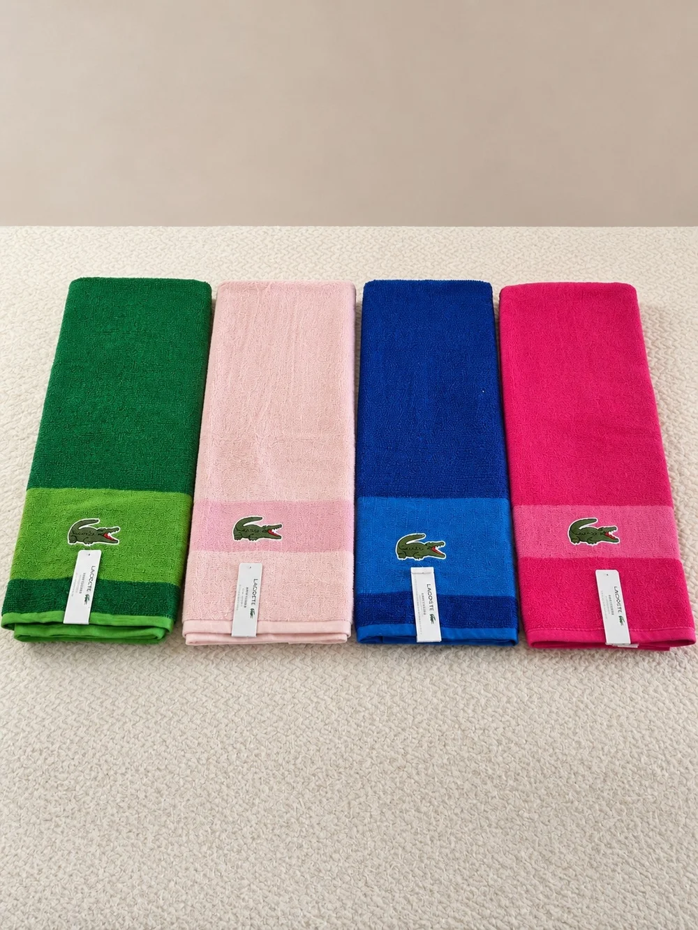 Lacoste Set of 4 Bath Towels Pink Blue Green Blush 100% Cotton NWT - Picture 2 of 9